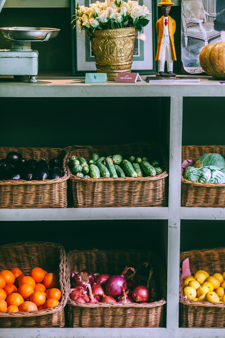 assorted fruits and vegetables on market rack