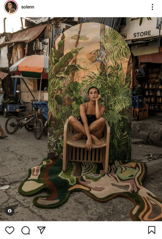 Solenn Heussaff received backlash after sharing this photo of her painting with the urban poor community as background.