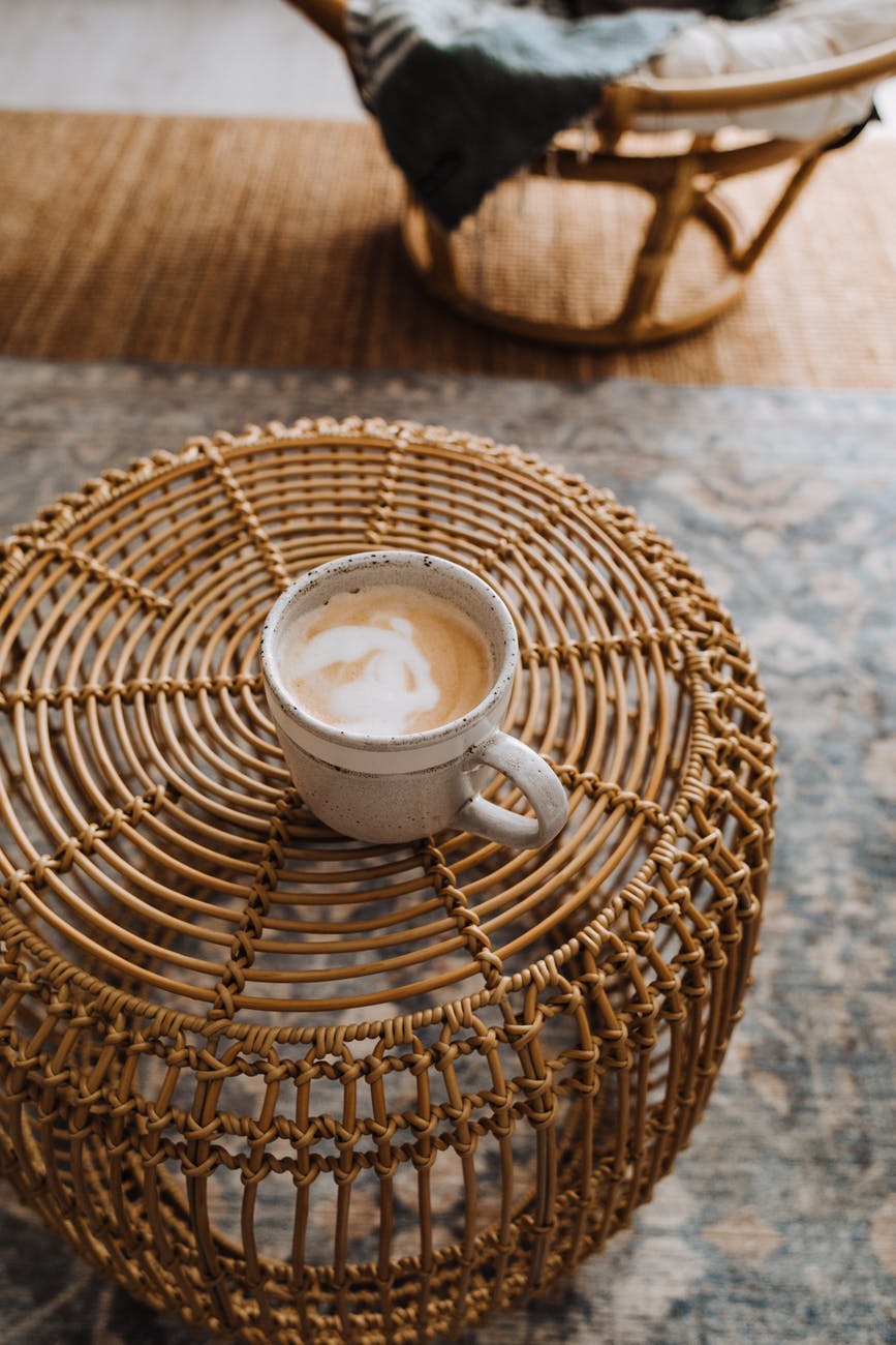 coffee placed on wicker table in house