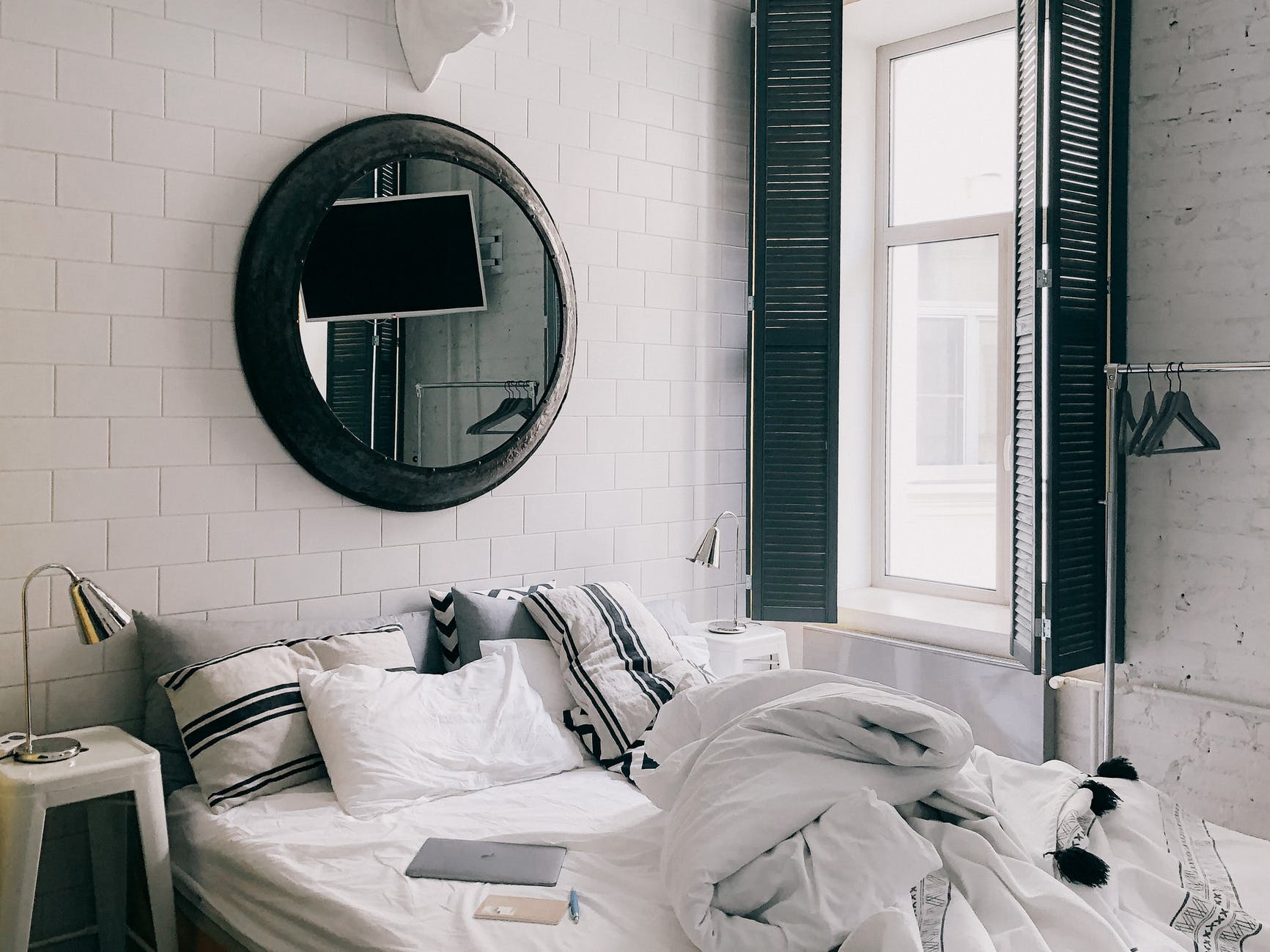 stylish bedroom interior in black and white colors