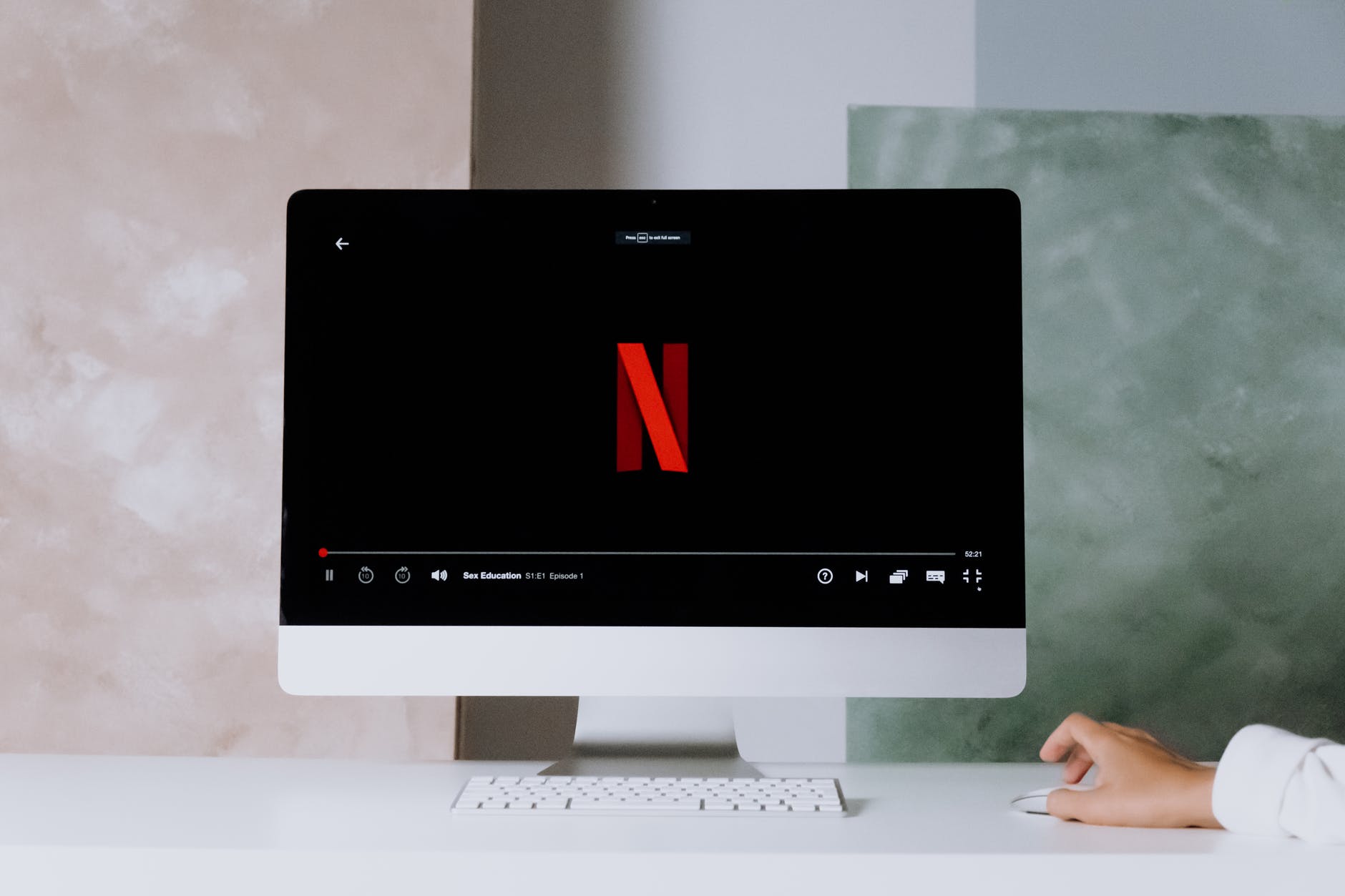 netflix on an imac | Netflix Wins Rights for Post-Theatrical Release of Spider-Verse 2 and More Sony Films Through New Deal
