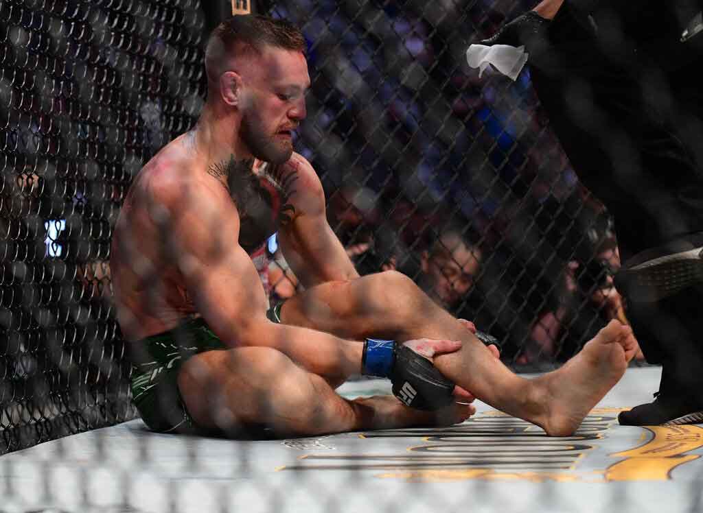 FreebieMNL - Conor McGregor Suffers Gruesome Leg Injury in Fight Against Dustin Poirier