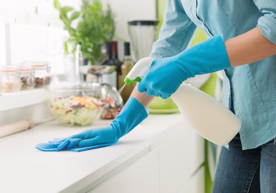 https specials images.forbesimg.com imageserve 863454098 Woman cleaning with a spray