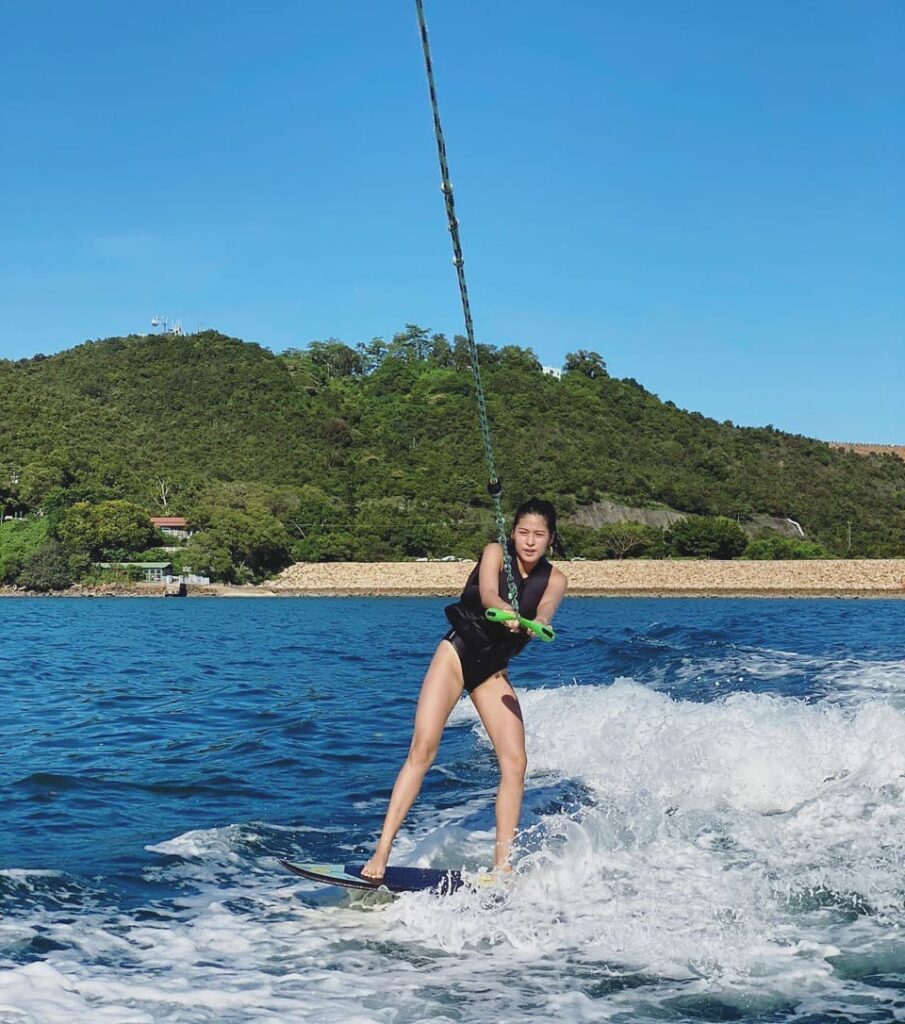 Filipino model Jeanine Tsoi wakesurfing in Sai Kung