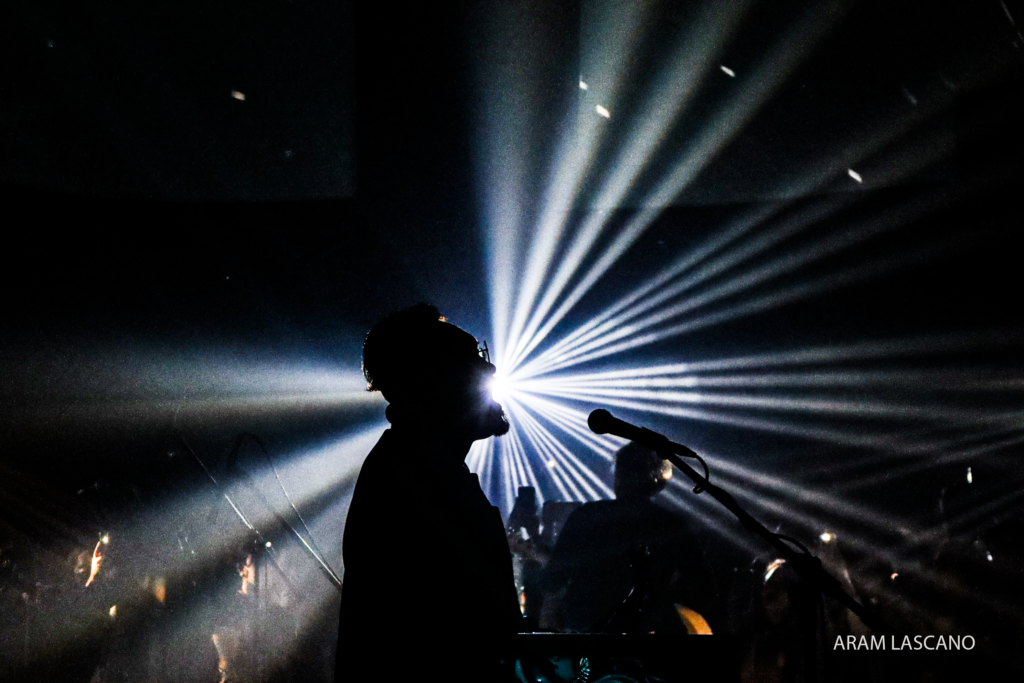 Bassist Gosh Dilay on a fractal of lights during their performance at PETA Theatre  | Photo by Aram Lascano