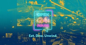 neon light speech bubble with the words open 24 hours in it and the words eat dine unwind under it