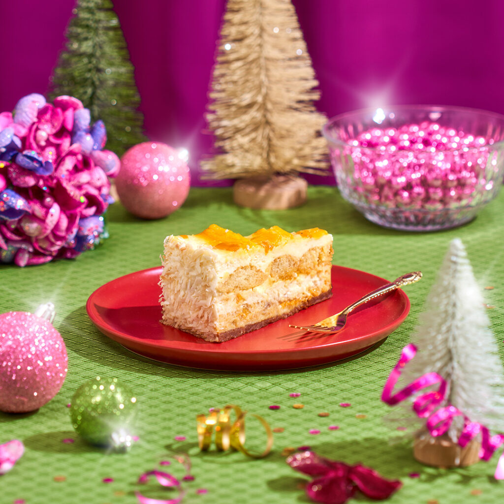 1080px x 1080px Holiday FY24 Food Highlight Mango Tiramisu Cheesecake slice